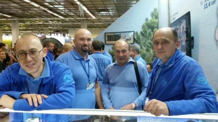 The Hogland team participants: Nikolay Tyagin, Yuriy Kostkin, Igor Volchkov and Andrey Yakovlev at the stand of their expedition