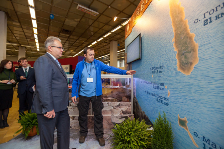 Andrey Murov examining the map of the region for future research 