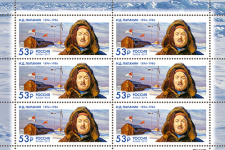 На почтовой марке изображён портрет И.Д. Папанина на фоне арктической станции «Северный полюс-1»