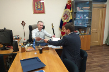 Подписание соглашения. Фото пресс-службы Красноярского краевого отделения РГО