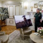 Sergey Shoygu gave the Patriarch Kirill the following photo works of the finalists of the contest «The most beautiful country»: «A Little Varg» of Alexander Romanov, and «The Autumn Ornament» of Maxim Kostin