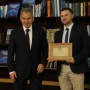 The President of the Russian Geographical Society Sergey Shoygu is handing in the diploma to Egor Ivanov, the winner of the contest in the nomination «For success in public activity». Photo by the press-service of the Russian Geographical Society